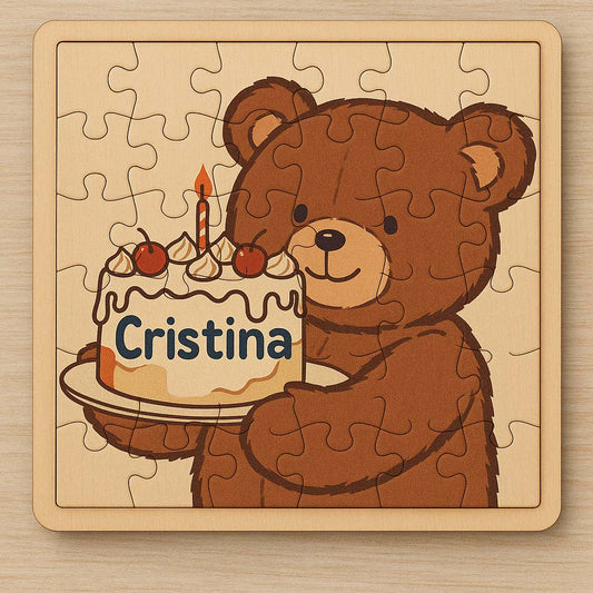 Puzzle di un orso che tiene in mano una torta di compleanno