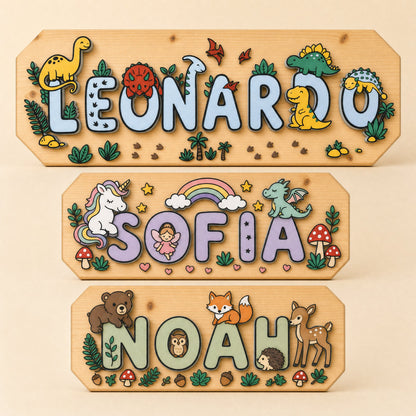 Le targhe dei tre temi affiancate: Leonardo dinosauri, Sofia magia, Noah bosco