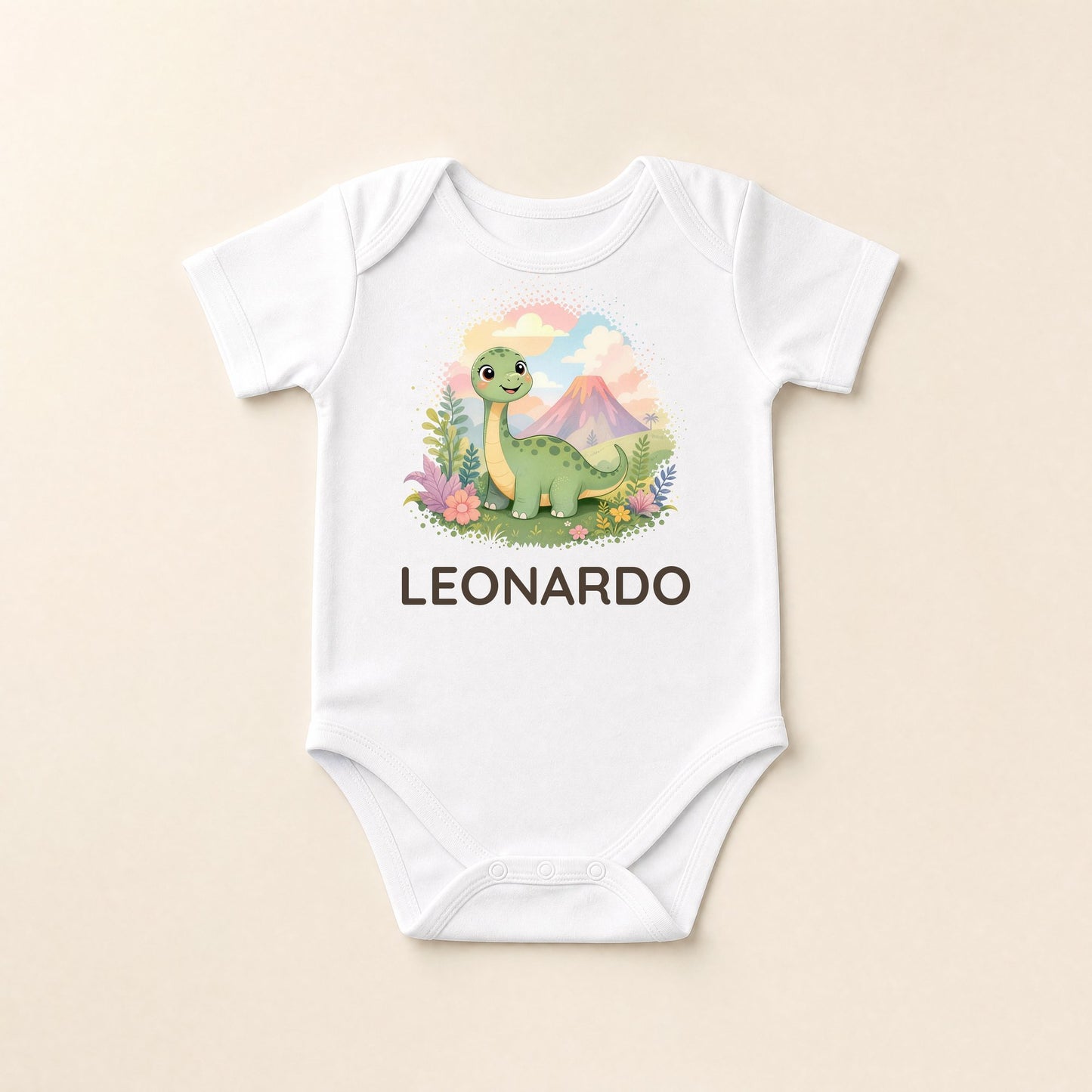 Body bianco disteso con la scena del nido di dinosauri e il nome Tommaso