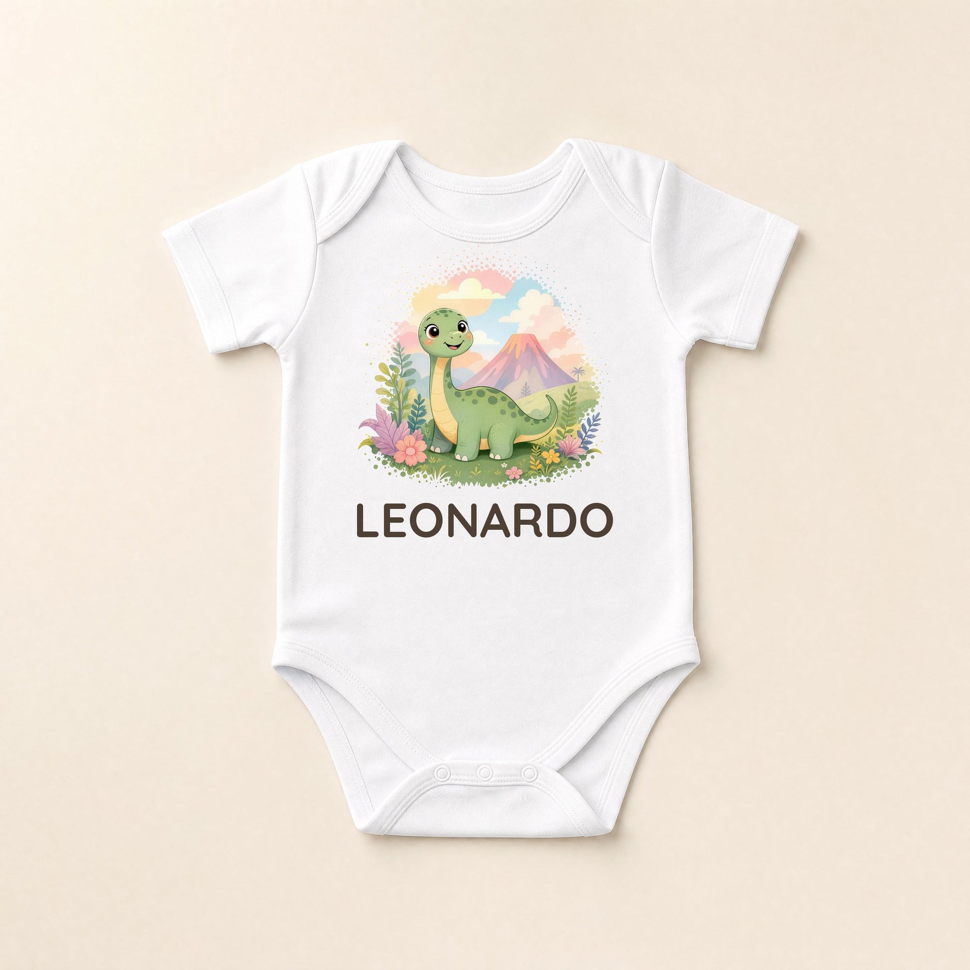 Body bianco disteso con la scena del nido di dinosauri e il nome Tommaso