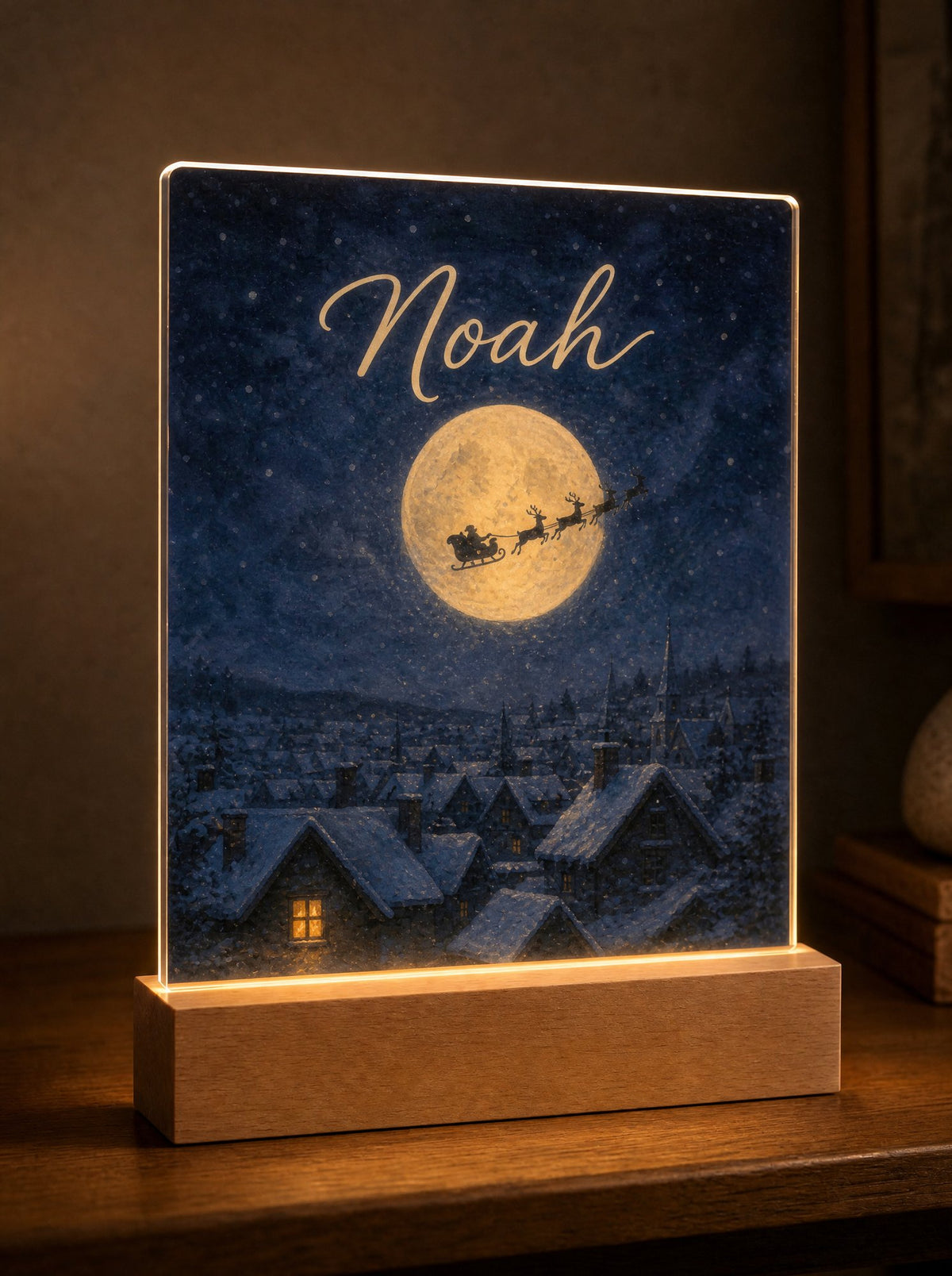 Scena La slitta di Babbo Natale con le renne sotto la luna piena, nome Noah tra le stelle