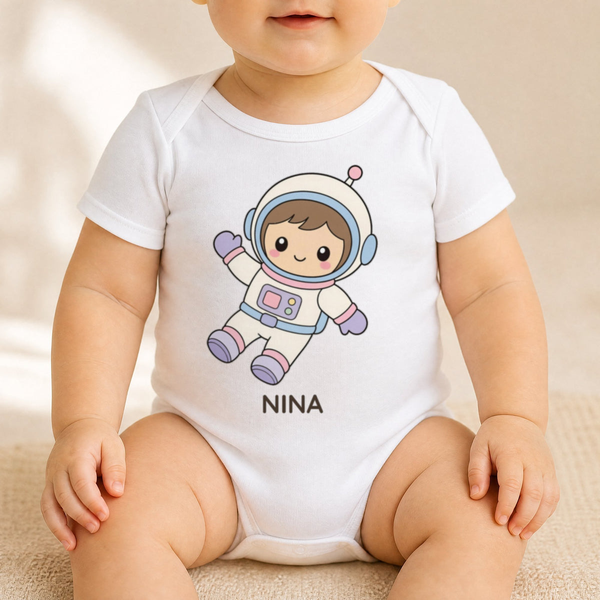 Body indossato con grafica astronauta e il nome del bimbo sul petto